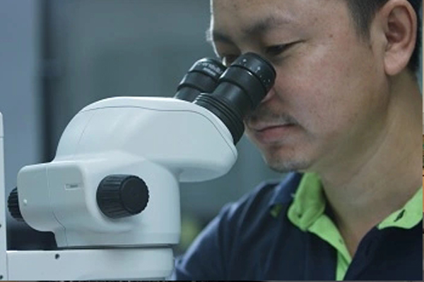 precision molded visual plastics inspection under microscope
